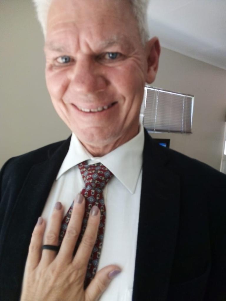 Dad dressed smartly in a suit and tie